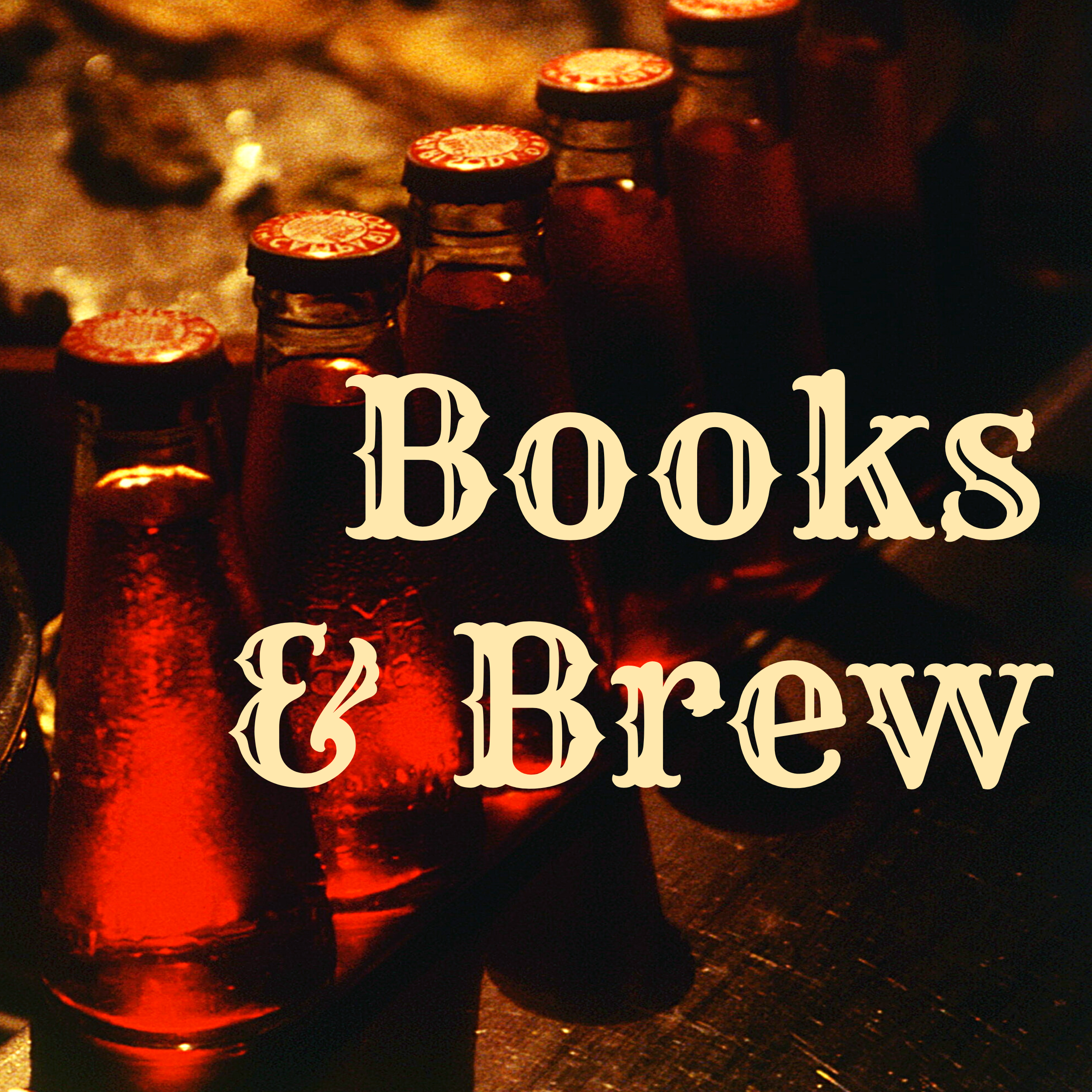 Books & Brew. Brown bottles of beer in dramatic lighting.