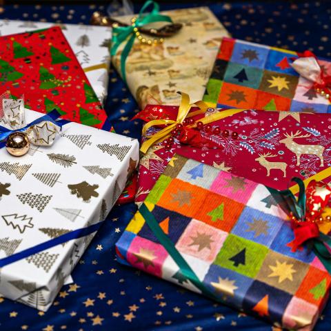 packages in holiday wrapping paper