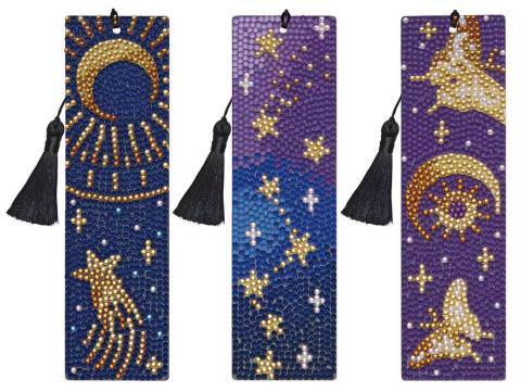 Three celestial pattern bookmarks in blues and golds