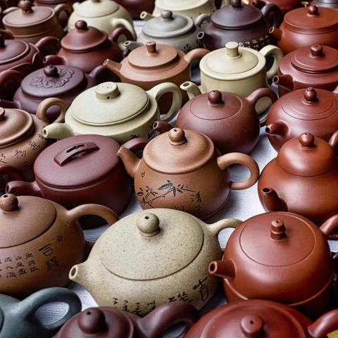 Rows of clay teapots